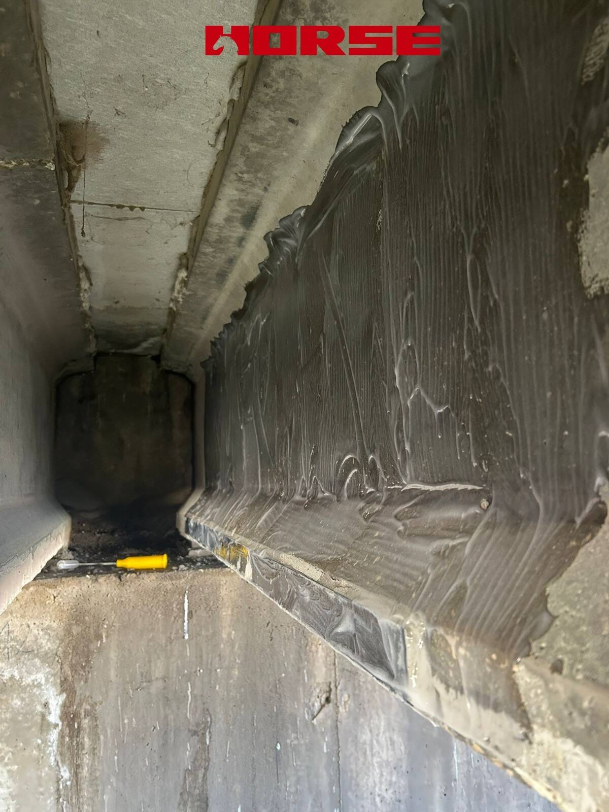 Strengthening of a Prestressed Concrete Multi-Girder Bridge with CFRP Laminate and U-warp